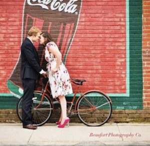 Lady on a bike leaning in to kiss her fiancé - what's in your social media feed?